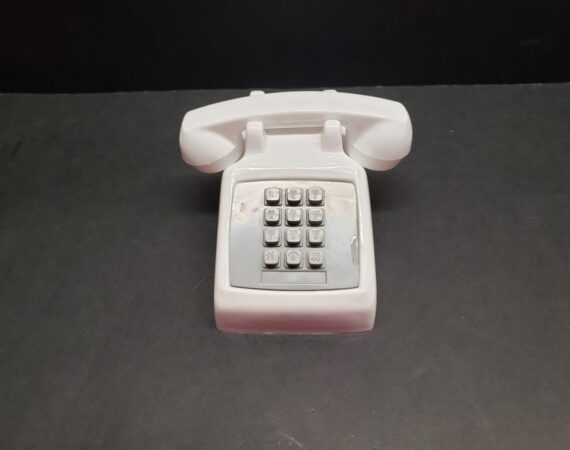 Tiny toy 2500 Telephone with flashing strobe lights.